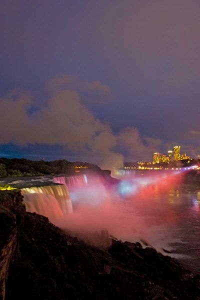 NY, Niagara Falls Waterfalls and mist at dusk